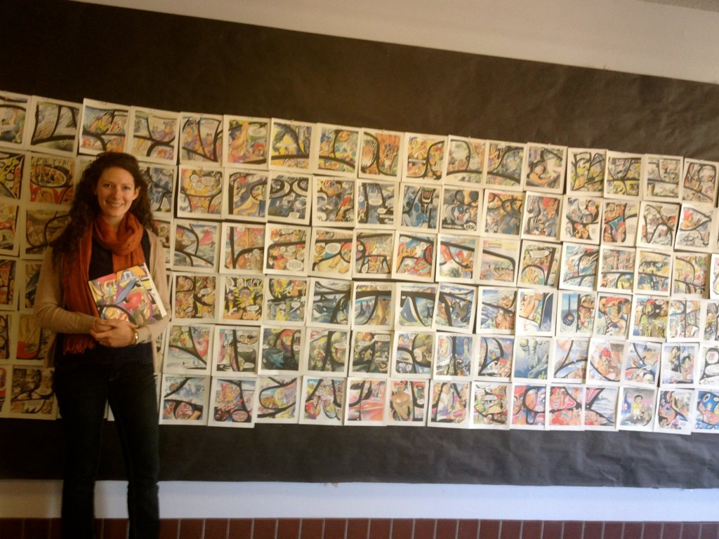 "Red", an Indigenous graphic novel by Michael Nicoll Yahgulanaas. The artwork I am standing in front of in this photo was done in a workshop I participated in where we cut up the book, breaking the linear narrative structure, and opening up the book to further analysis and understanding.  