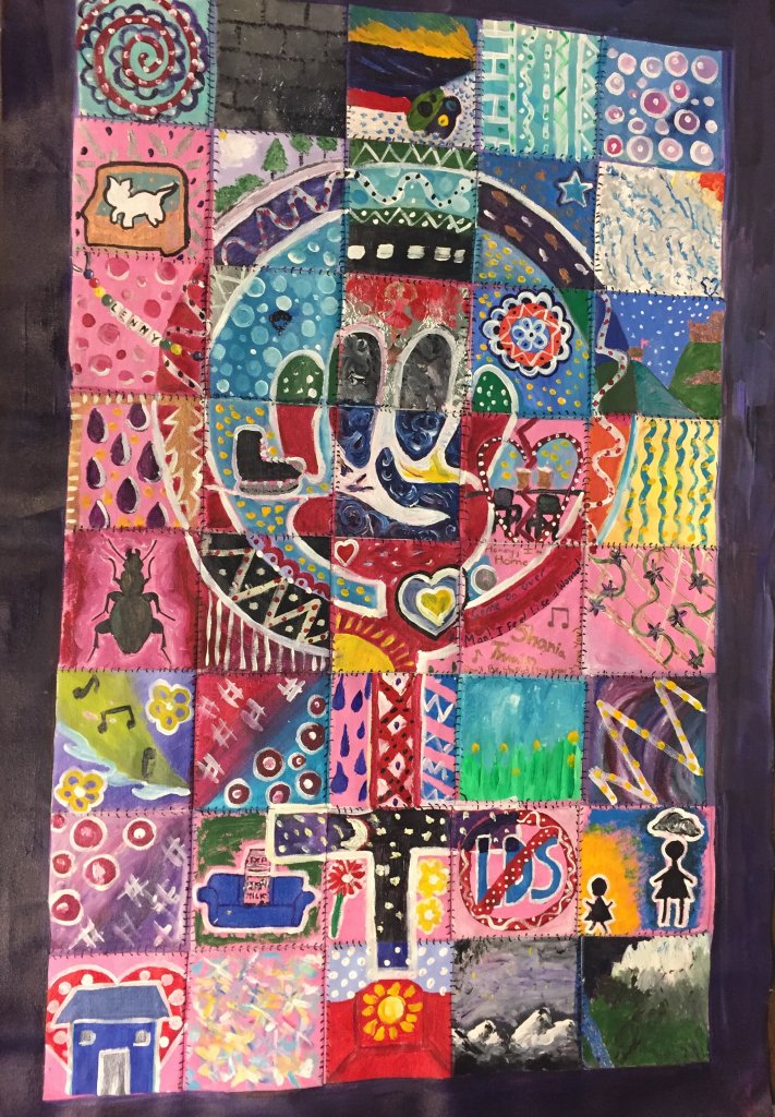 This is a photo of a mosaic I took part in creating with my cohort. It's a great visual reminder that all of our individual stories can come together to create something bigger- a community!